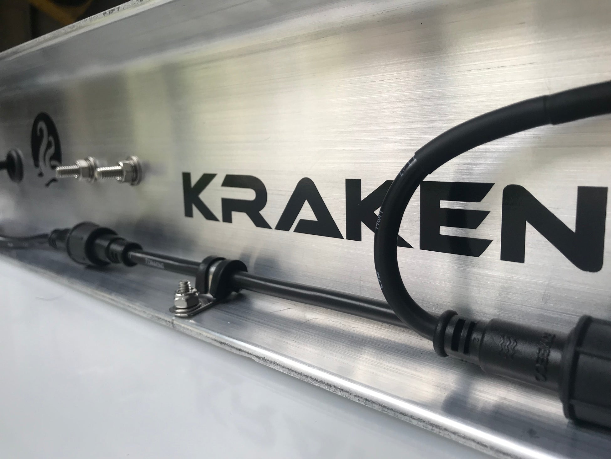 Kraken jacketed wiring secured to an open trailer frame